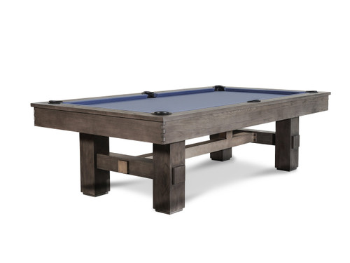 The Nixon Billiards Kemp Slate Pool Table in Grayson Grey finish, showcasing its rustic industrial design with oversized rustic rails and a sleek brushed metal cross beam. Perfect for modern and rustic home or office settings.
